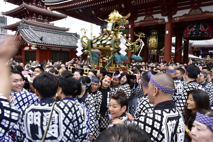 Sanja Matsuri 2023 bearers packed shoulder-to-shoulder under a mikoshi