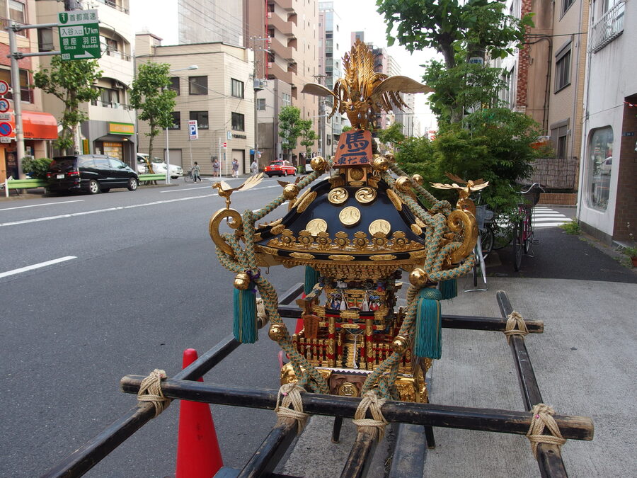 Mikoshi carried through Asakusa streets during Sanja Matsuri