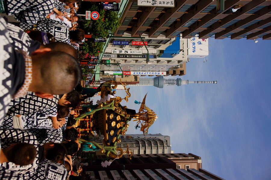 Sanja Matsuri mikoshi parade with the Tokyo Skytree behind
