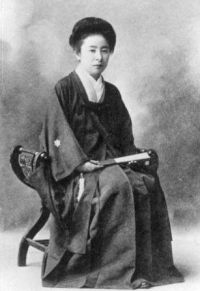 Meiji-era educator Shimoda Utako wearing hifu coat over hakama, the uniform style she designed for her girls school that spread nationally