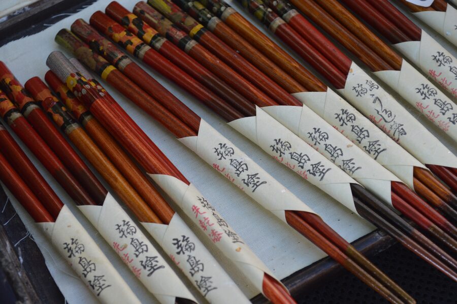 Rows of patterned Wajima-nuri lacquer chopsticks for sale at Wajima Asaichi